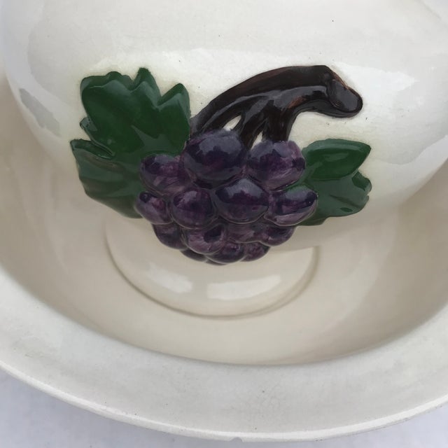 This is a beautiful vintage, mid century pitcher with matching wash basin, both featuring clusters of grapes and leaves....