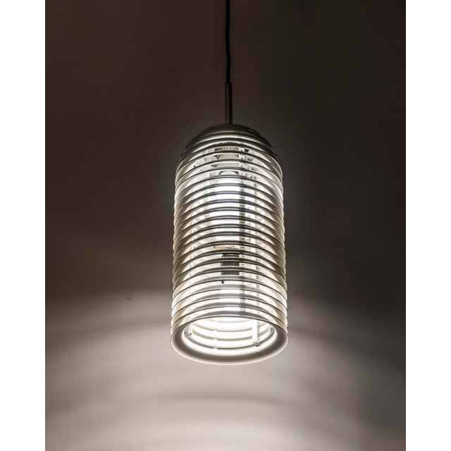 The “Saturn” pendant lamp, designed by Kazuo Motozawa for Staff Leuchten in Germany during the 1970s. This is the...