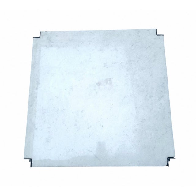 Designed by the renowned architect and designer Osvaldo Borsani for Tecno, this low coffee table is a piece of...