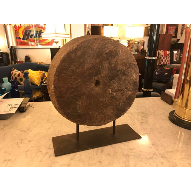 This is a very interesting, vintage Mill Stone that has been mounted on a metal stand. It is definitely a great...
