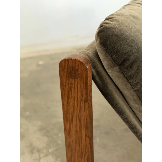 W32 D35.5 H26 SW24.5 SD20 SH20 These handcrafted lounge chairs anchored by a bold architectural solid oak base with...