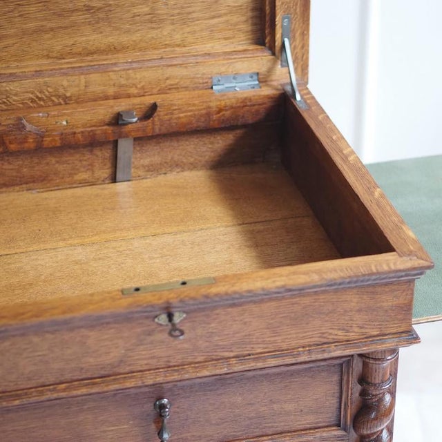 This writing desk originated in the late 19th century, presumably around 1890, and follows the historicist design language...