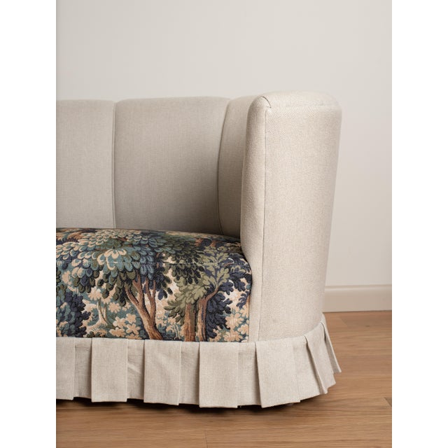 Upholstered fabric sofa with skirt c. 1950's. Condition: newly upholstered Dimensions: 28.25" h x 60" w x 28" d Seat...