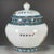 This is a beautifully crafted Chinese Famille Rose porcelain ginger jar featuring a vibrant and detailed scene of elegant...