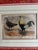 A 19th century hand-colored lithograph of an exotic pair of chickens, double matted and in a gold frame. There appears to...