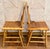 A Rare Pair of Vintage 1970’s Chinoiserie Bamboo Ladder Back Accent Chair With Woven Rattan Seat. In the iconic Paul...