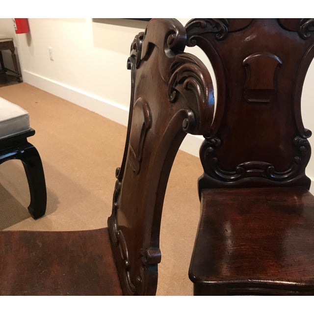 Brown Pair of Hand Carved Mahogany Armorial Hall Chairs For Sale - Image 8 of 12