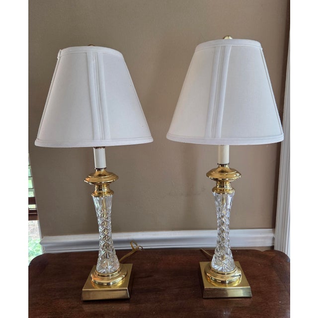 Beautiful vintage Crystal and Brass Table lamps in beautiful condition. Shades and Finials included. 23.5" Tall to top of...