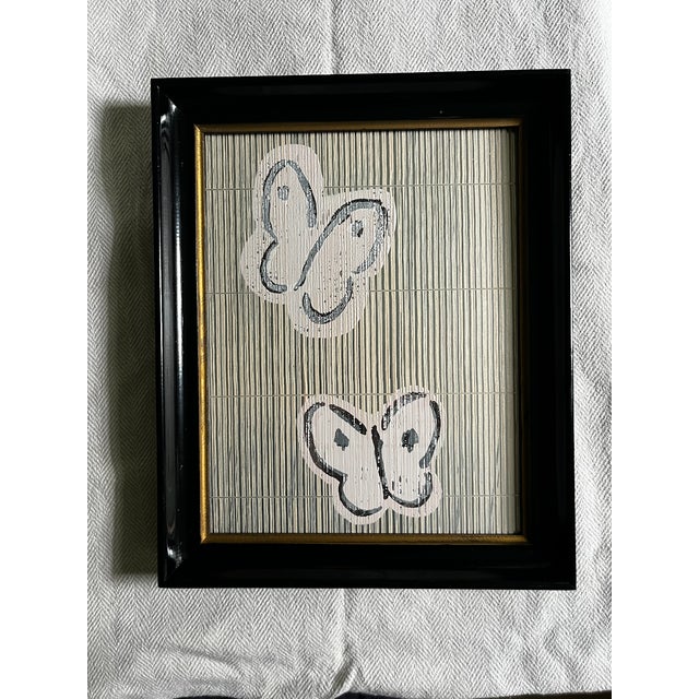 High Gloss Thick Antique Frame with Hunt Slonem Textured Butterfly Wallpaper Featuring a two butterflies, with textured...