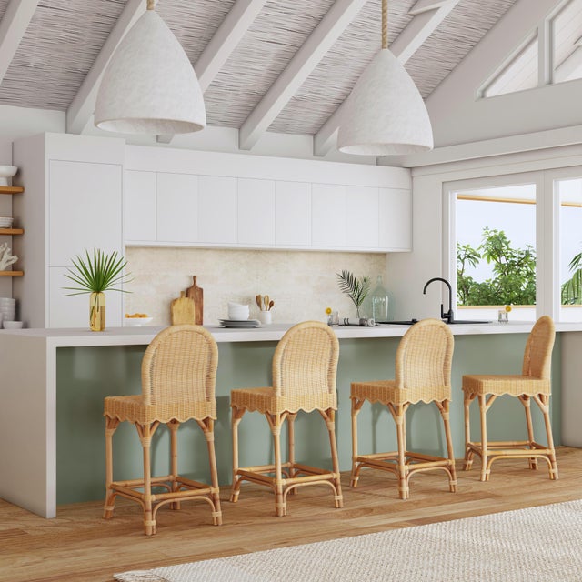 Elevate your space with our Butler Specialty Company Flora natural rattan counter stool. Crafted with love, its hand-woven...