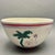 • This vibrant studio art pottery bowl features a hand-painted Memphis style design with a stylized palm tree, abstract...
