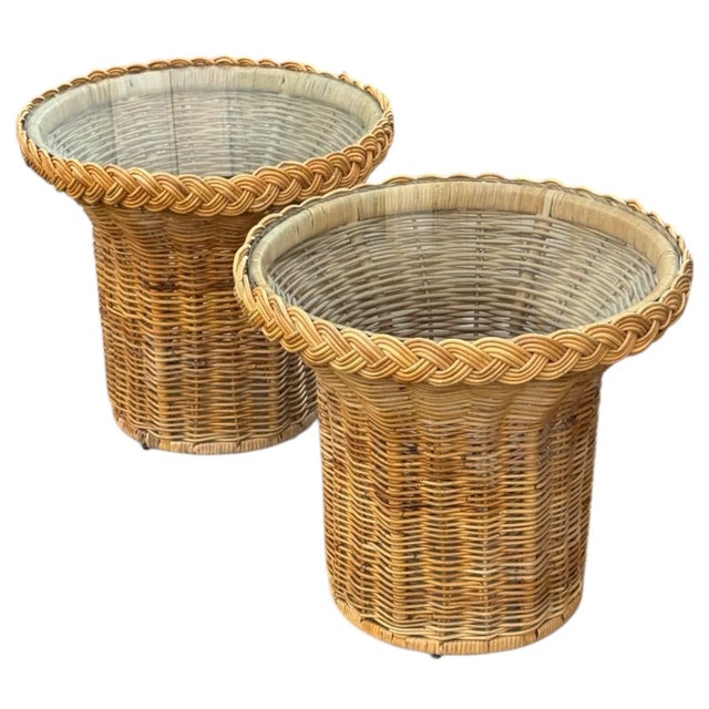 Excellent pair of woven wicker side tables with braided and fitted glass tops. The glass comes out easily but also fits...