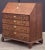 A fine George III slant top desk or bureau secretary chest of elm, oak and padouk woods, c.1780 - an inlaid slant front...