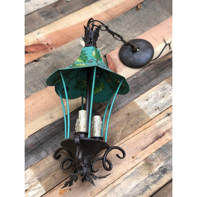 From the Papillion collection of Savoy House lights. Measures approximately 21” from top of light to bottom, 10” across at...