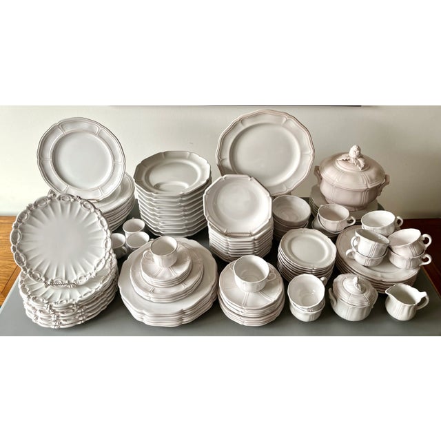 This fabulous and very rare set of vintage circa 1960's French faience dinnerware features; 8 dinner plates, 8 soup bowls,...
