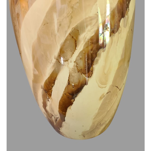 Add a touch of vintage charm to your living space with this beautiful table lamp. Crafted from glazed ceramic, this piece...