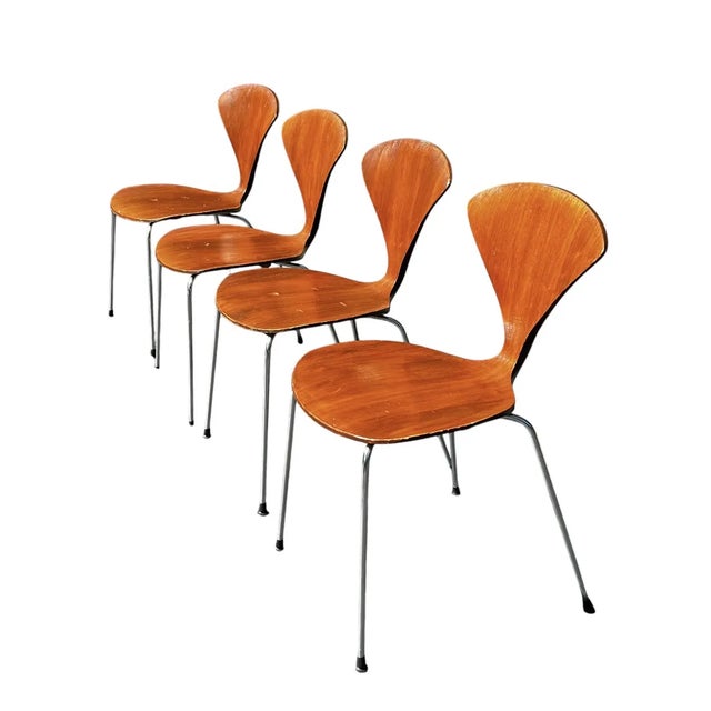 Add a touch of timeless refinement to your home with this exquisite pair of walnut veneer vintage mid-century modern...