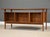 A mid century modern teak floating top desk designed by Kai Kristiansen with a drawer with the capability for hanging...