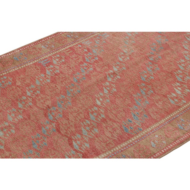 Hand-knotted wool, this 4x10 vintage Kurdish runner rug originates from Turkey circa 1970–1980—a work of the tribal people...