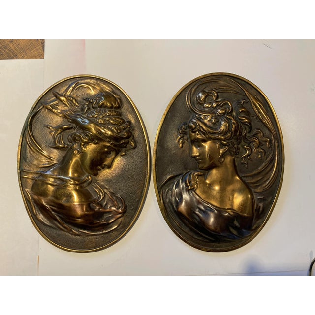 Art Nouveau Augustus Saint-Guadens wall hangings relief castings in solid brass signed “Marvin Brass”, 13”x10”x1”h; 7 Lbs ea.