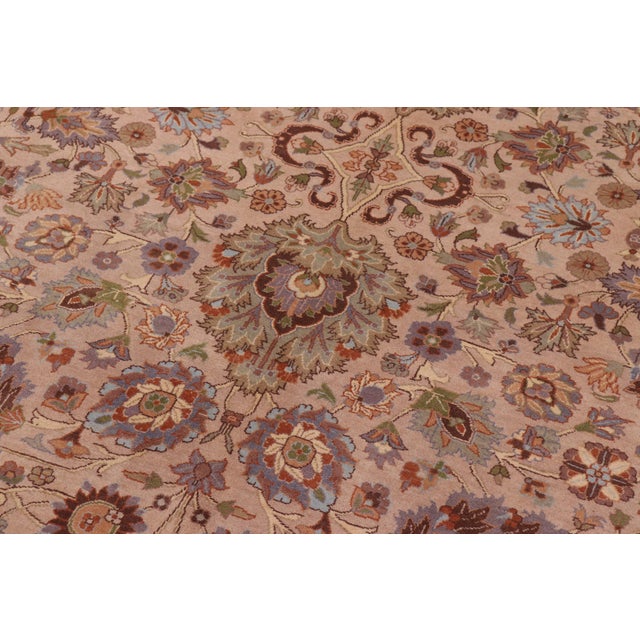 Designed with mesmerizing intricacy and gorgeous color palette, this hand-knotted masterpiece demonstrates the beauty and...