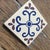 Charming hand thrown and painted Tavalera tile. Dimensions: 4.125" x 4.125" x .25"