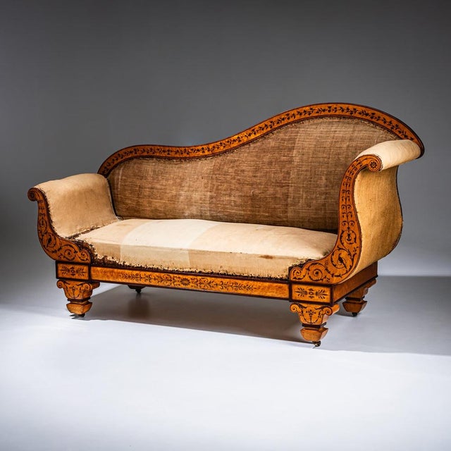 Right-hand méridienne with gracefully curved backrest and volute-shaped sides. The piece stands on baluster legs with...