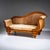 Right-hand méridienne with gracefully curved backrest and volute-shaped sides. The piece stands on baluster legs with...