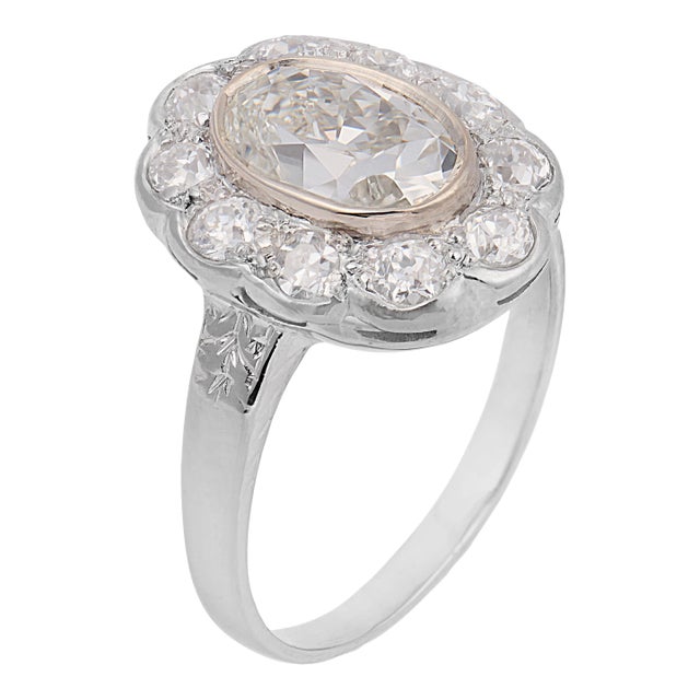 1930s Art Deco Gia 1.02 Carat Oval Cut Diamond Cluster Platinum Engagement Ring, Size 4 For Sale