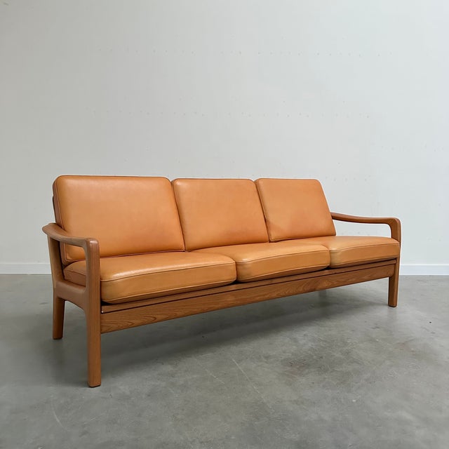 Danish Cognac Leather Sofa by Juul Kristensen, in Very Good conditions. Designed 1960 to 1969 This piece has an...