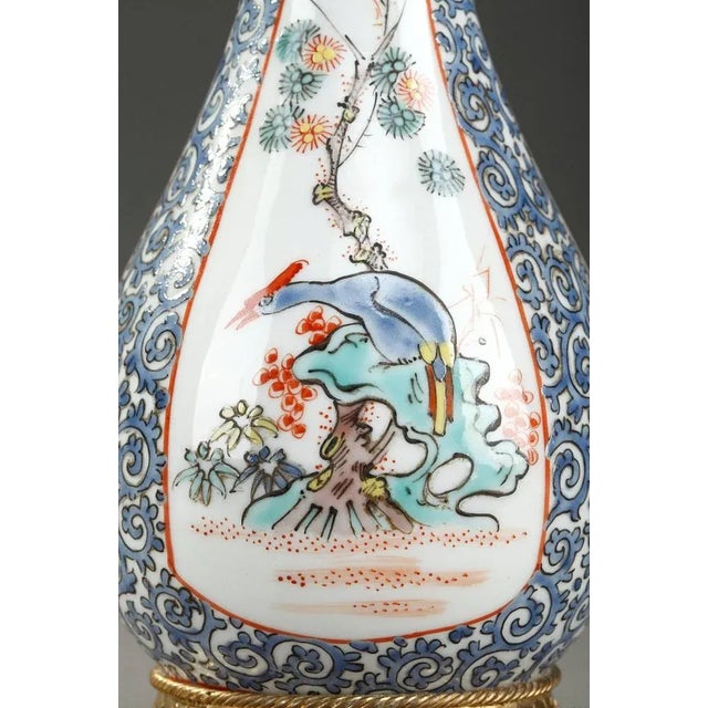 Late 19th century perfume bottle and opium flacon crafted of porcelain and multicolored enamels, with gilt and chiseled...
