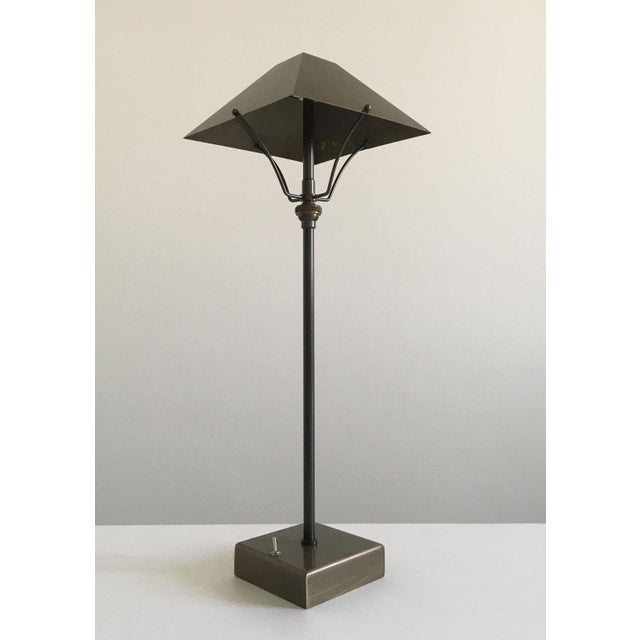 This charming pair of brass table lamps are totally made in Italy in brass with burnished finish. His innovative...