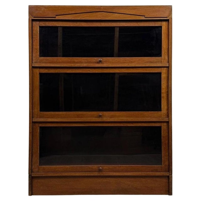 A superb and highly practical early 20th-century Globe Wernicke-style bookcase, finely constructed in mahogany and...