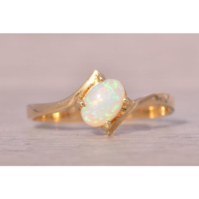 The Gama: Natural Australian Opal Bypass Ring in Yellow Gold For Sale - Image 9 of 11