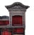 Monumental Japanese Meiji Shibayama cabinet, the structure crested by a pair of well carved dragons, topped with roof...