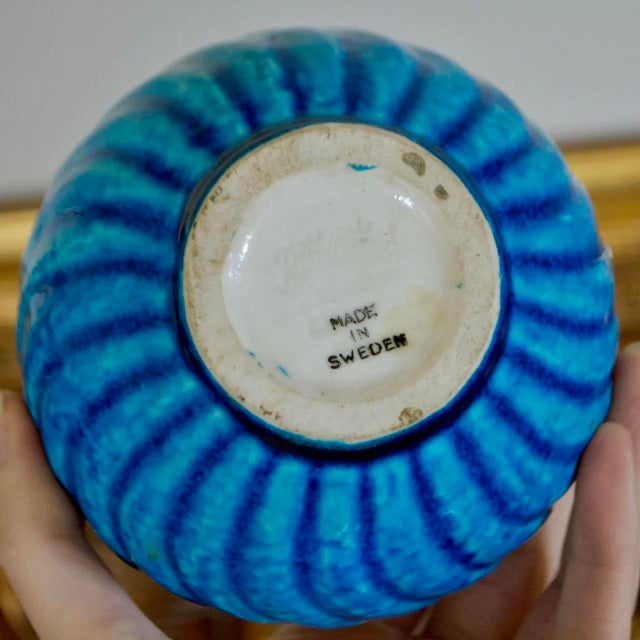 Beautiful Swedish stoneware vase designed by Gunnar Nylund for Rörstrand, featuring a sculptural coiled form with a rich...