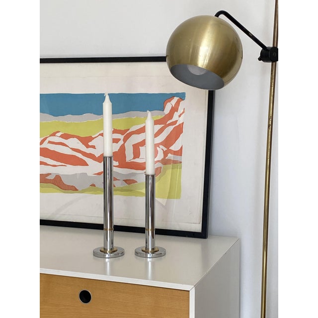 A quietly elegant pair of Danish handmade candleholders from the 1970s — graduated in height by design, so that when...