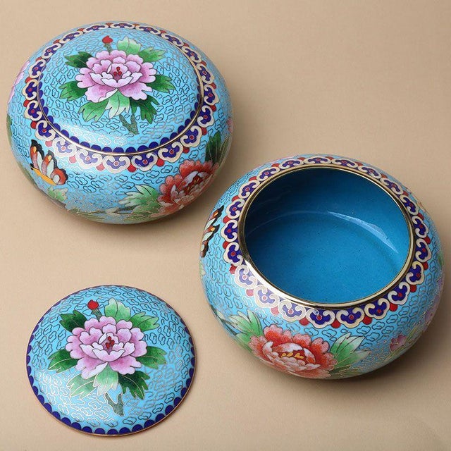 This is a charming pair of vintage cloisonné enamel round boxes, traditionally used as game piece containers for Go or...