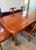Exhibiting its pleasing, simple lines in a distinct Ming style, this exquisite dining set is intricately carved in Chinese...