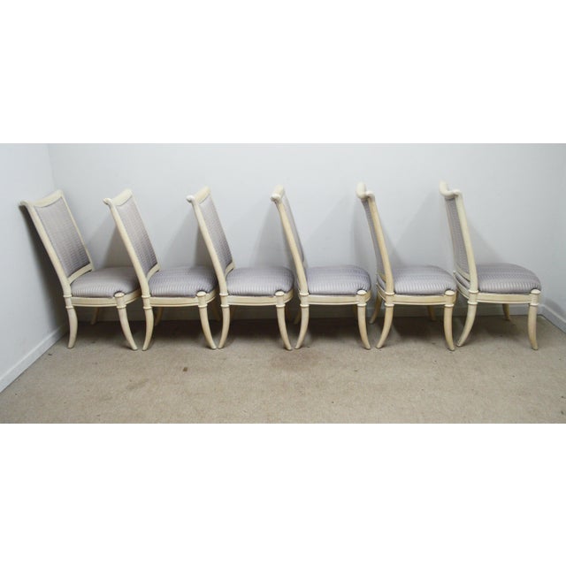 Set of 6 Dining Chairs by Henredon. Store item#469. They featured upholstered back and solid wood construction .