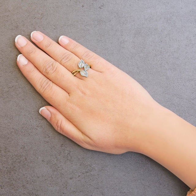 Early 21st Century 18K Yellow and White Gold Plated .925 Sterling Silver 3/8 Cttw Baguette and Round Diamond Bypass Triple Leaf Ring (I-J Color, I1-I2 Clarity) - Size 9 For Sale - Image 5 of 6
