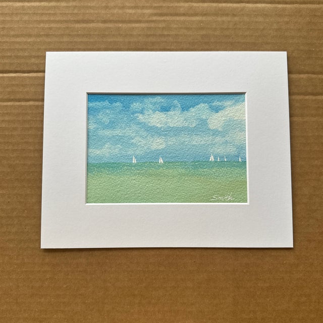 Set sail with this breezy seascape featuring a distant regatta under a cloud-filled sky. Crisp greens and blues give this...