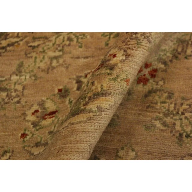 This gorgeous transitional handmade rug follows an abstract pattern which exotically repeat like a continuous reflection....