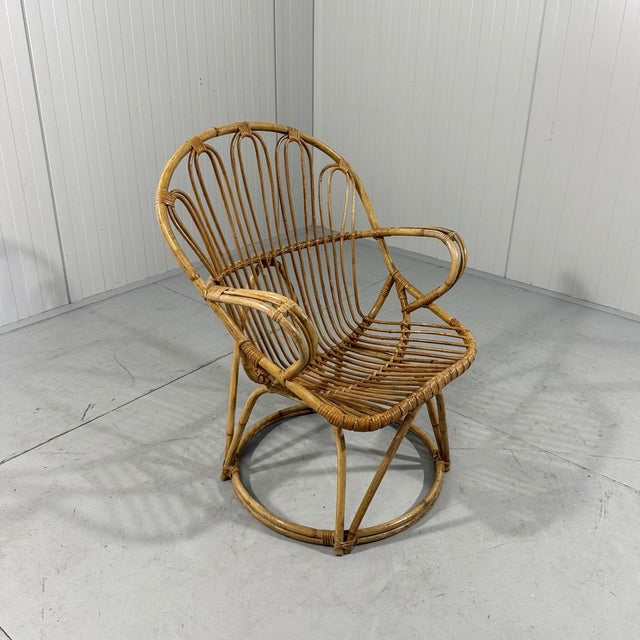 Lovely easy chair by Rohé Noordwolde, Netherlands. Nice shaped rattan chair with a comfortable seat. 1960’s. In very good...