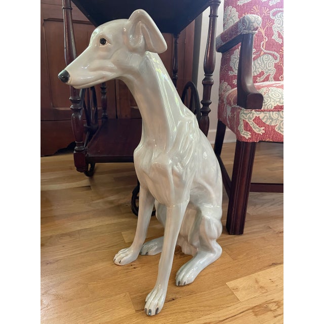 Greyhounds and whippets are two of the most elegant animals and this life sized ceramic statue will add elegance to any...