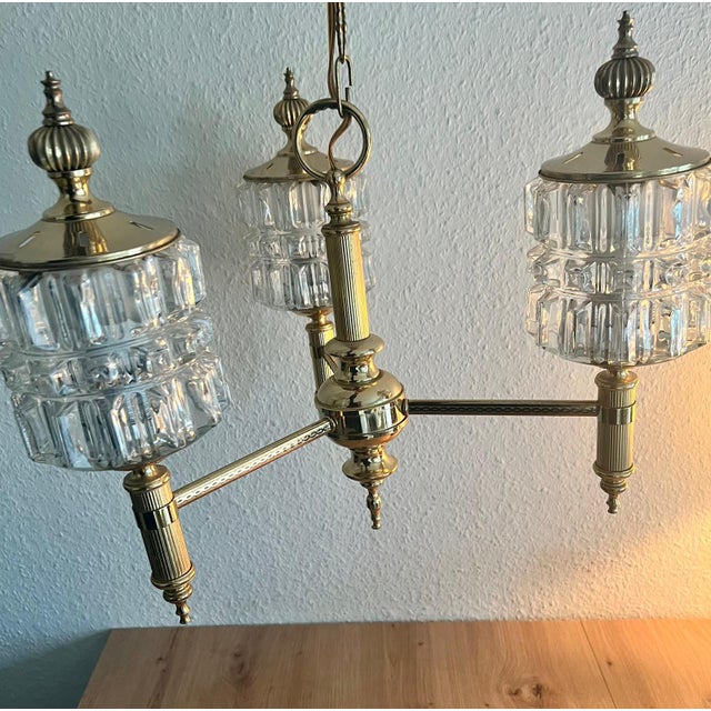 3 arm chandelier, gold-plated brass, beautiful patina Up to 250V (Europe/UK Standard).The wiring of this item may be...