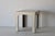 An off -white matte laminate end table with nice lines. 1980s Modern Postmodern design period. Great as an end table or...