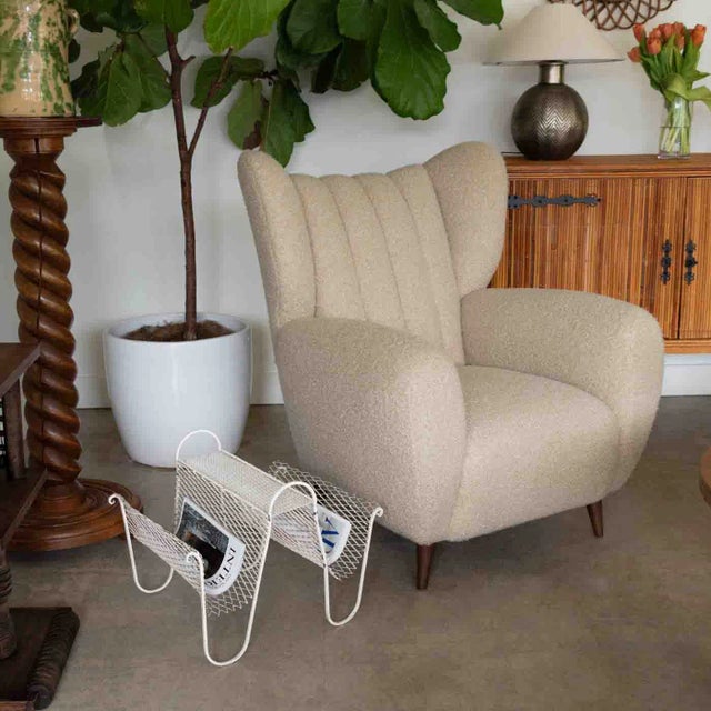 Incredible metal magazine rack in the style of Mathieu Matégot from France, 1950's. Original perforated metal frame with...