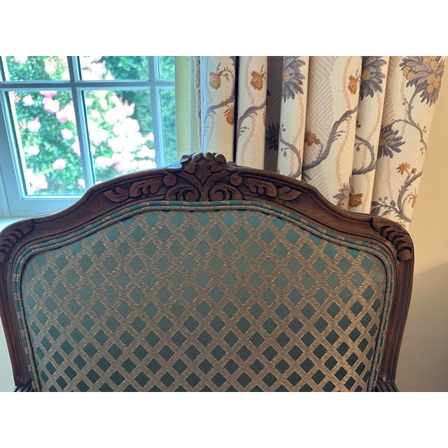Early 18th Century Pair of Vintage French Louis XIV-Style Carved Fauteuil Chairs by Baker Furniture Company. For Sale - Image 5 of 6