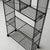 c. 1970s. Constructed of iron. Shelf heights adjustable. Made in Spain. This piece is attributed to the mentioned...